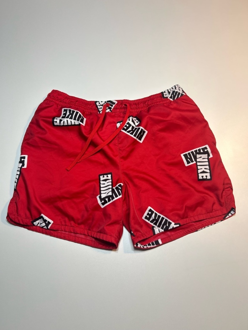 Nike Red Athletic Shorts with Black & White Logo Blocks